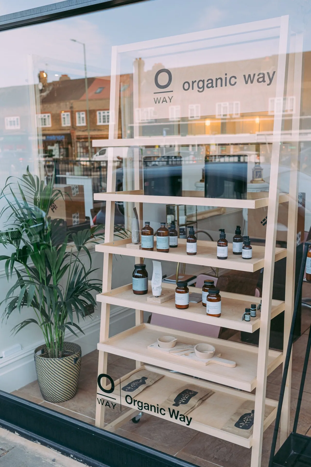 Organic Way window display with apothecary bottles