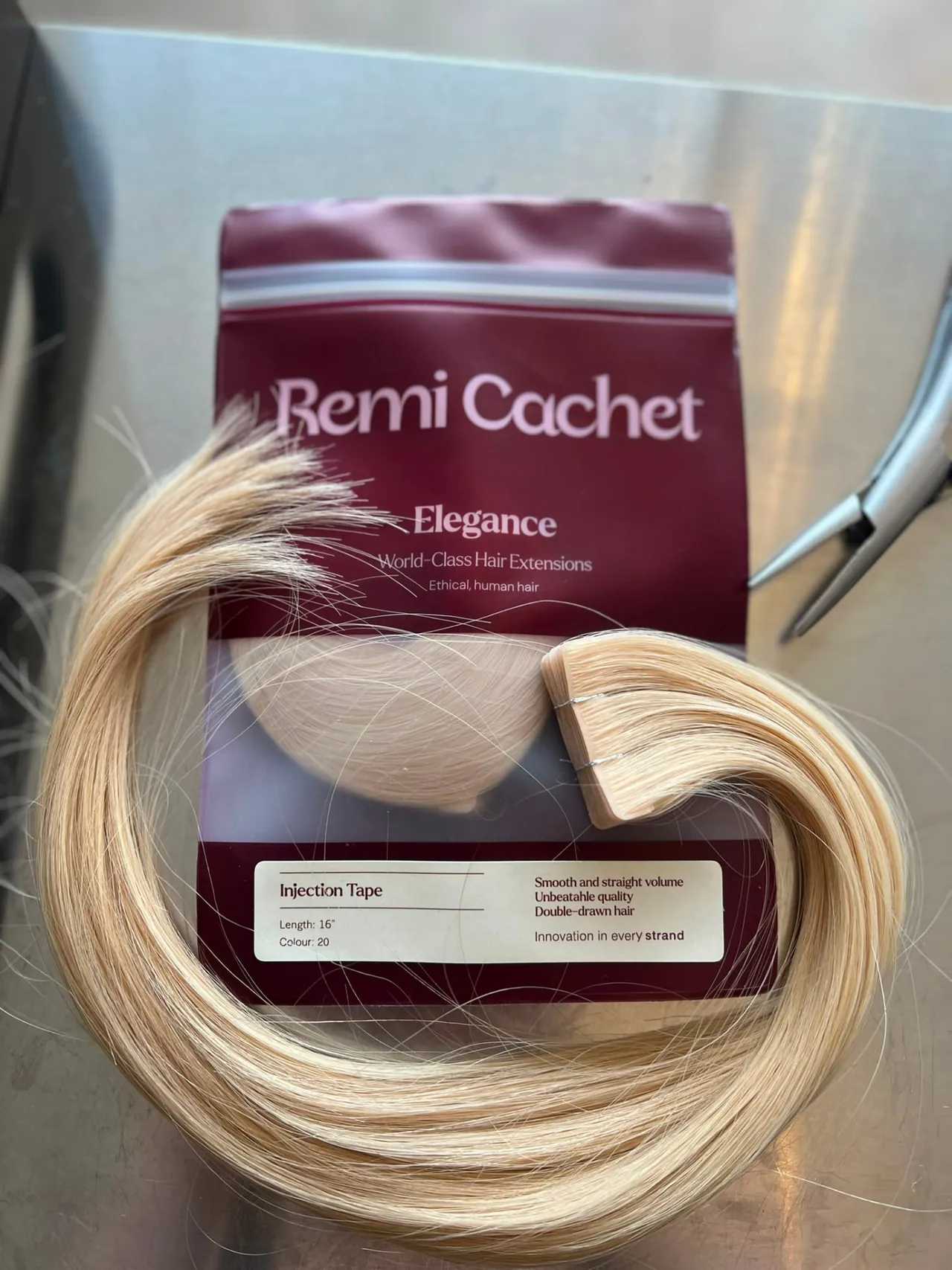 Remi Cachet blonde tape hair extensions ready for fitting at Esther Alexander near Epsom