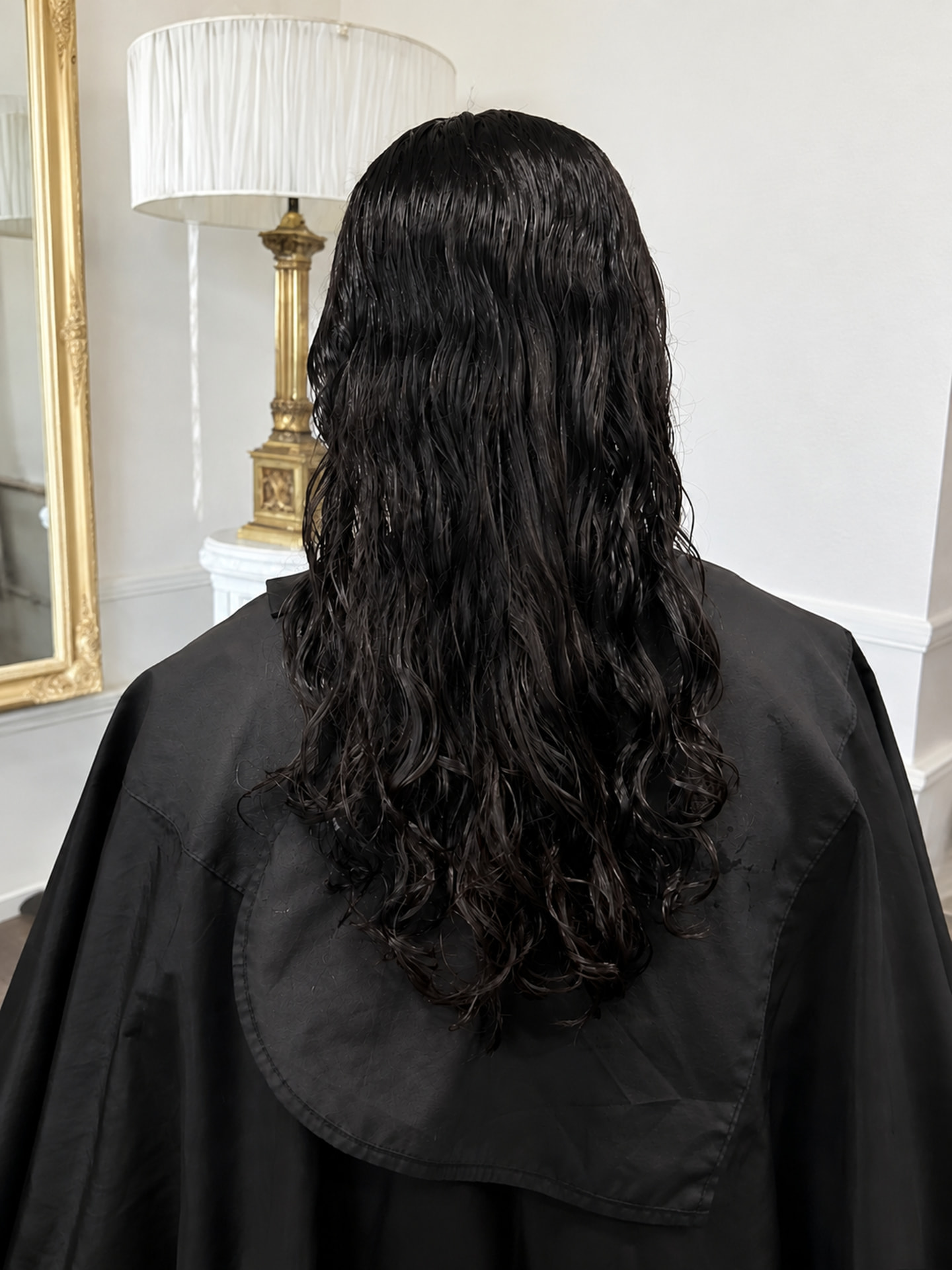 Dark hair before a smoothing treatment at Esther Alexander in Ewell